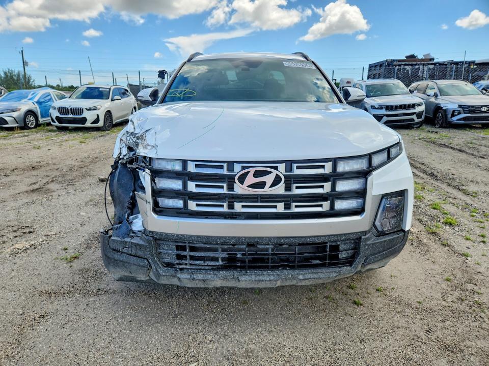 2025 Hyundai Santa cruz VIN 5NTJBDDE9SH129941 COPART salvage auction — FRONT END, FL - CERTIFICATE OF TITLE, sold $13,100 on 2026-09-03 (photo 5)