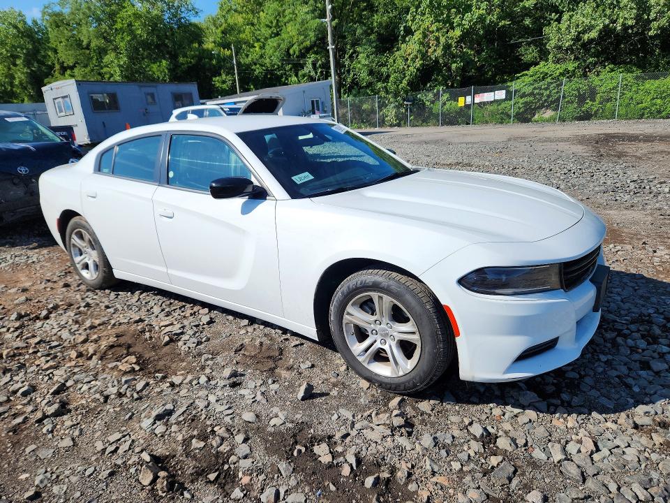 2023 Dodge Charger VIN 2C3CDXBG7PH564307 COPART salvage auction — MINOR DENT/SCRATCHES, Wv - Certificate Of Title, sold $15,900 on 2026-09-01 (photo 4)