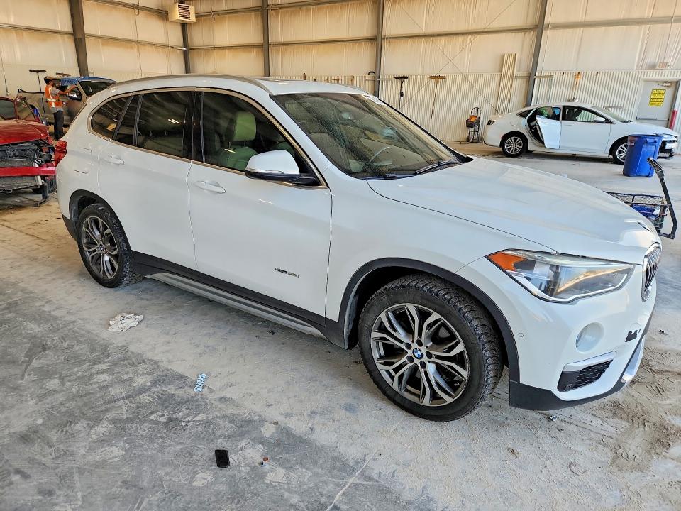2017 BMW X1 VIN WBXHT3Z35H4A53635 COPART salvage auction — NORMAL WEAR, Ne - Cert Of Title-Rebuilt Salvage, sold $700 on 2026-09-08 (photo 4)