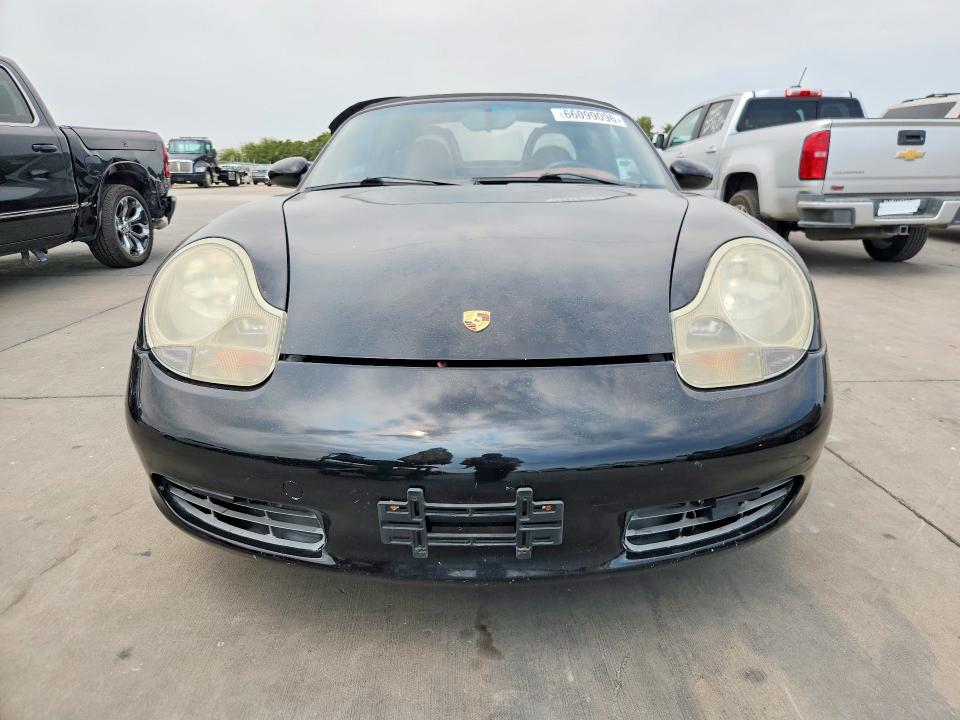 2002 Porsche Boxster VIN WP0CA29802U623306 COPART salvage auction — NORMAL WEAR, TX - CERT OF TITLE-REBUILT SALVAGE, sold $4,000 on 2026-09-03 (photo 5)