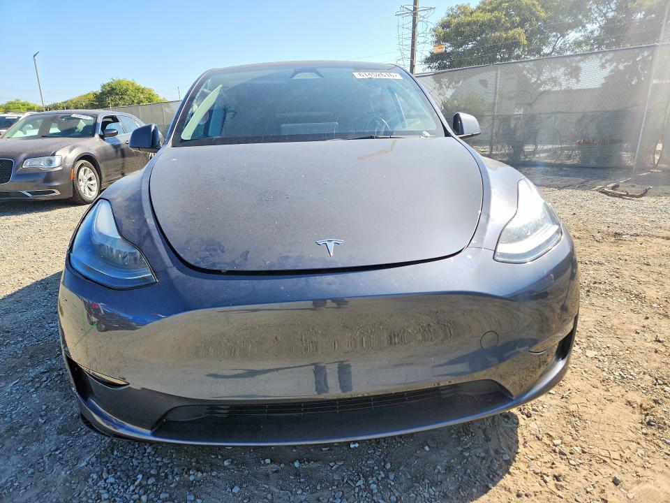 2023 Tesla Model y VIN 7SAYGDEFXPF921126 COPART salvage auction — FRONT END, Ca - Salvage Certificate, sold $12,100 on 2026-08-28 (photo 5)