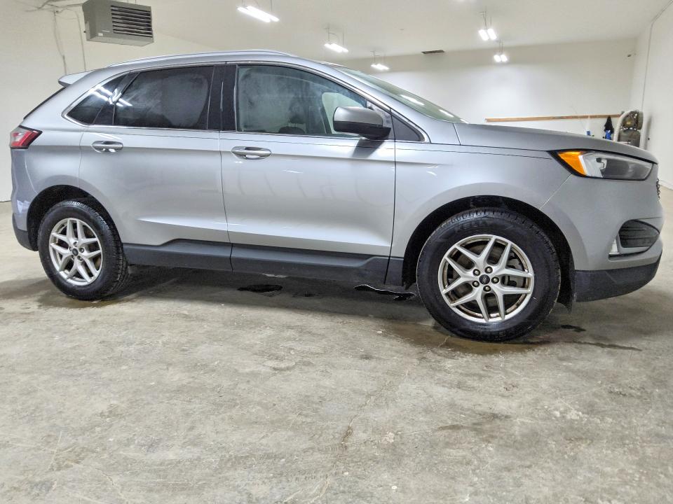 2023 Ford Edge VIN 2FMPK4J92PBA02706 COPART salvage auction — MINOR DENT/SCRATCHES, OH - CERTIFICATE OF TITLE, sold $9,100 on 2026-08-18 (photo 4)