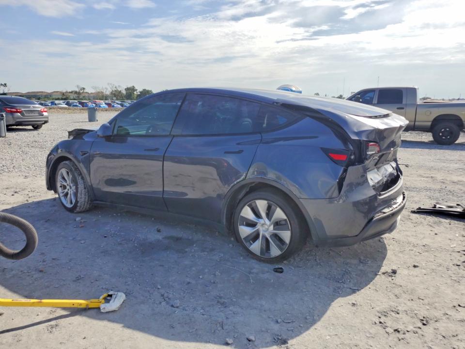 2020 Tesla Model y VIN 5YJYGDEE4LF047032 COPART salvage auction — FRONT END, Fl - Certificate Of Title, sold $7,800 on 2026-08-25 (photo 2)