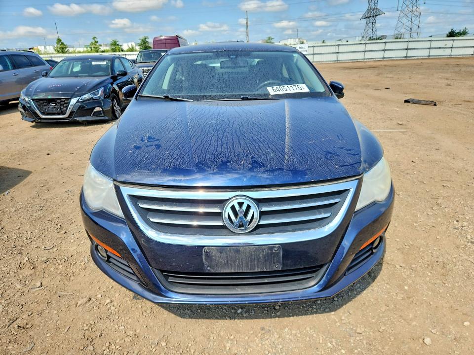 2012 Volkswagen VIN WVWHN7AN5CE509421 COPART salvage auction — NORMAL WEAR, Il - Certificate Of Title, sold $1,191 on 2026-08-11 (photo 5)