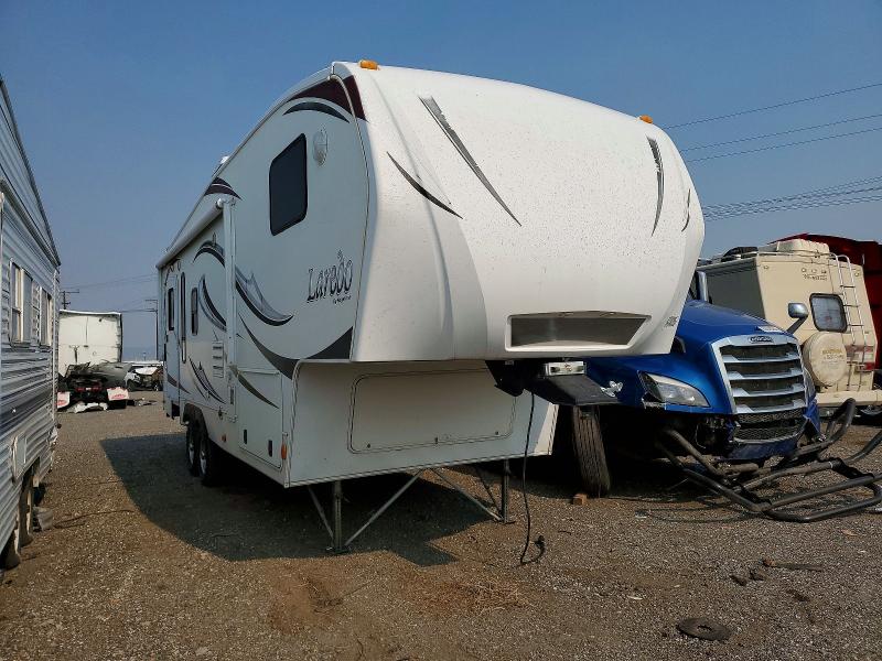 2011 Keystone Laredo VIN 4YDF26621BE601713 COPART salvage auction — ROOF, MT - CERTIFICATE OF TITLE TOTALED, sold $700 on 2026-09-29 (photo 1)