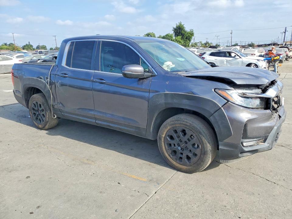 2023 Honda Ridgeline VIN 5FPYK3F54PB039730 COPART salvage auction — FRONT END, Az - Dis/Dlr/Exp Only Salvage Title (P), sold $10,100 on 2026-08-26 (photo 4)