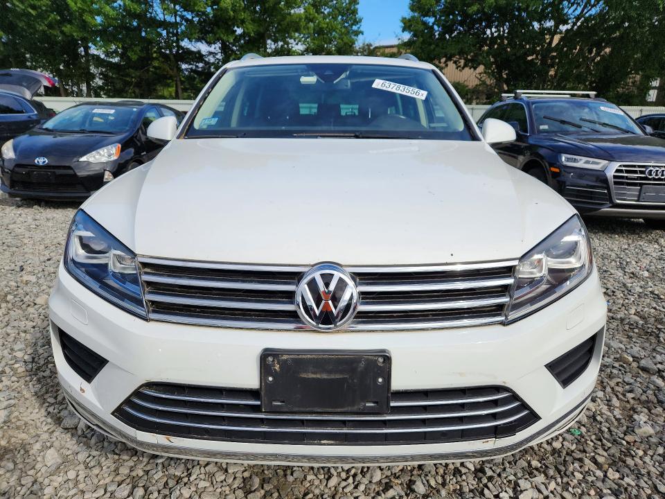 2016 Volkswagen Touareg VIN WVGEF9BP9GD006400 COPART salvage auction — MINOR DENT/SCRATCHES, Ma - Certificate Of Title, sold $500 on 2026-08-13 (photo 5)