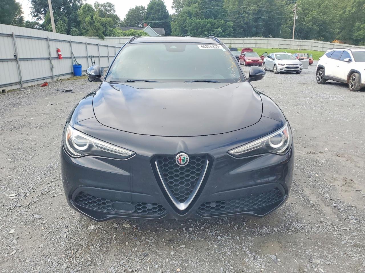 2018 Alfa romeo Stelvio VIN ZASFAKNNXJ7B90591 COPART salvage auction — Rear End, FL - DEALER ONLY CLEAN TITLE (P), sold $5,900 on 2026-09-15 (photo 5)
