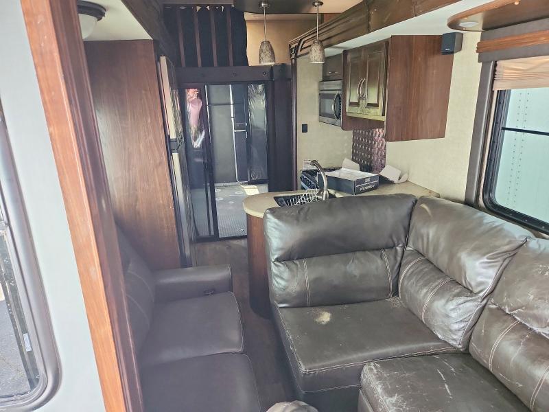 2015 Heartland rvs Cyclone fifth wheel VIN 5SFCG4333FE291690 COPART salvage auction — WATER/FLOOD, MI - CERT OF TITLE-FLOOD VEHICLE, sold $9,300 on 2026-09-01 (photo 6)