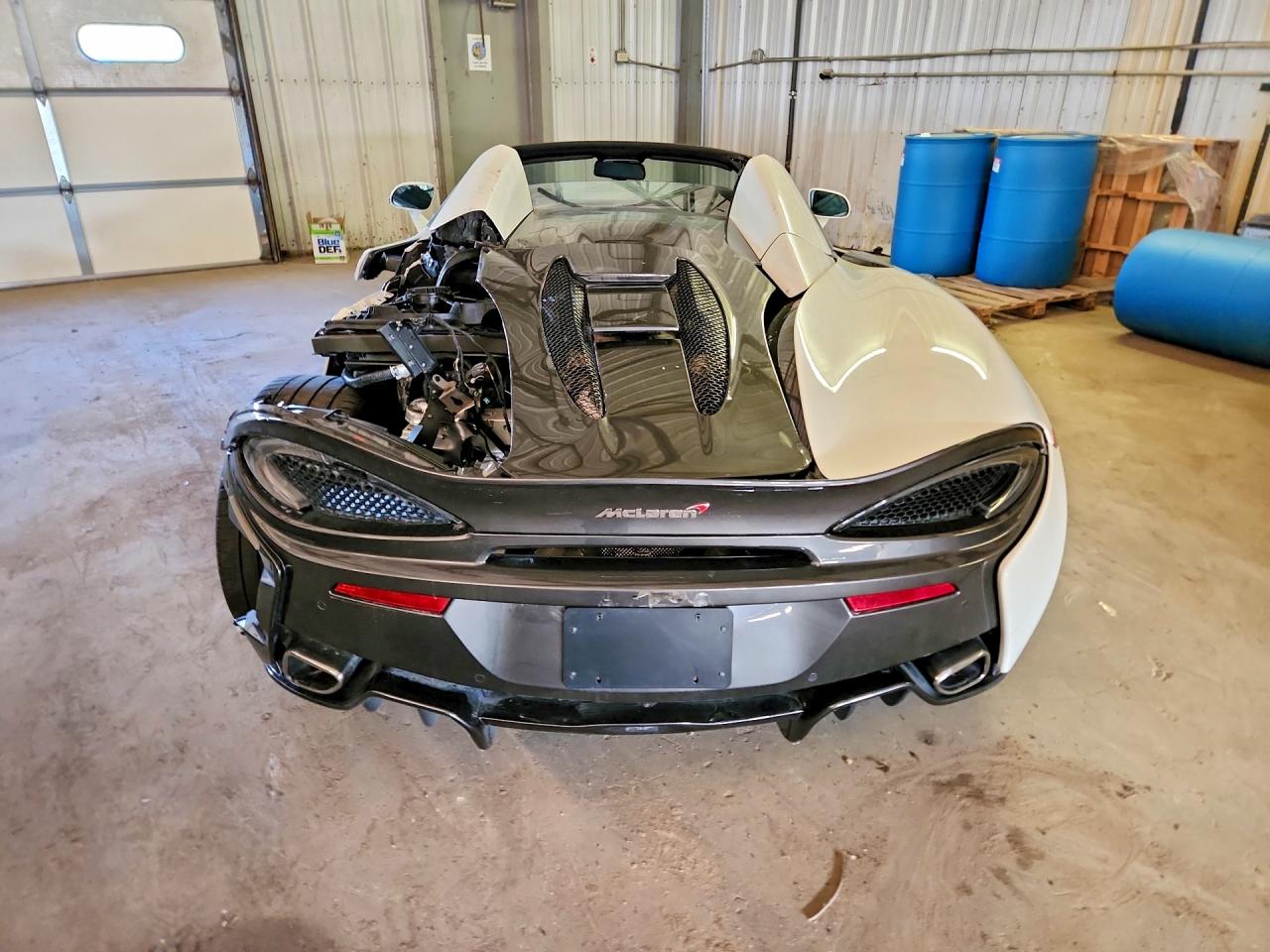 2018 Mclaren 570s VIN SBM13FAA7JW004851 COPART salvage auction — Side, TX - SALVAGE VEHICLE TITLE (P), sold $40,000 on 2026-09-02 (photo 6)
