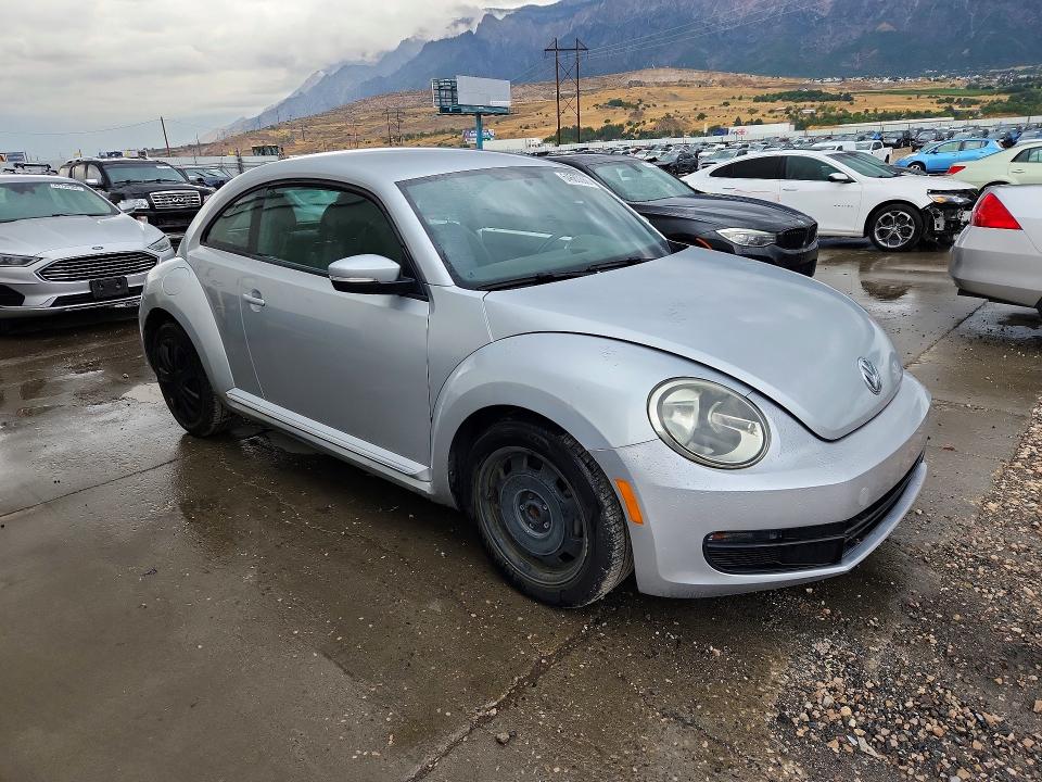 2012 Volkswagen Beetle VIN 3VWJP7AT3CM618607 COPART salvage auction — SIDE, Ut - Certificate Of Title, sold $825 on 2026-08-31 (photo 4)