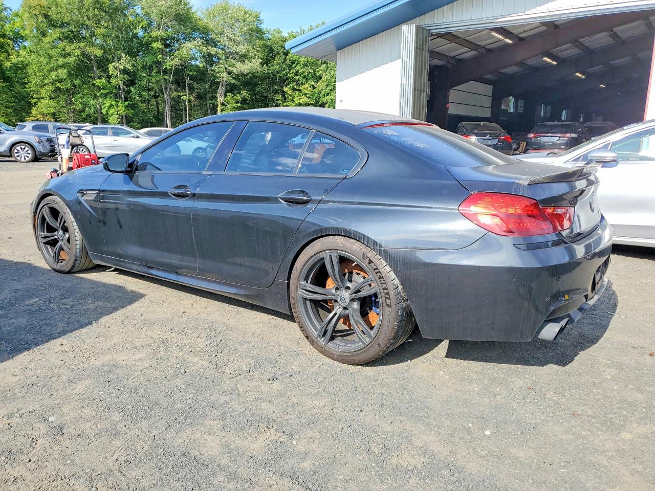 2016 BMW M6 gran coupe VIN WBS6E9C54GG437047 COPART salvage auction — Front End, FL - CERTIFICATE OF TITLE (P), sold $15,500 on 2026-09-03 (photo 2)