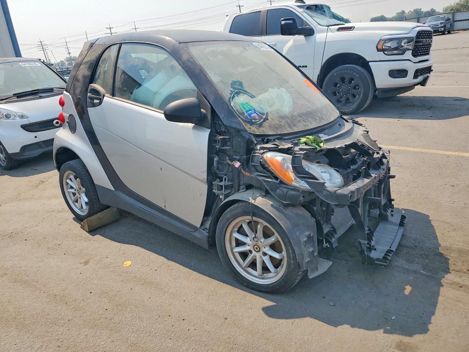 2009 Smart Fortwo VIN WMEEJ31X99K245883 COPART salvage auction — FRONT END, Id - Cert Of Title -Rebuilt Salvage, sold $90 on 2026-08-13 (photo 4)