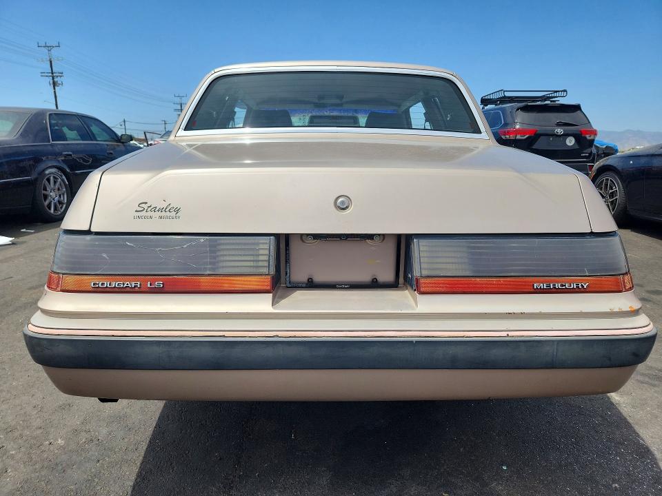 1986 Mercury Cougar VIN 1MEBP92F3GH728237 COPART salvage auction — VANDALISM, CA - DIS/DLR/EXP ONLY CLEAN TITLE, sold $225 on 2026-08-26 (photo 6)