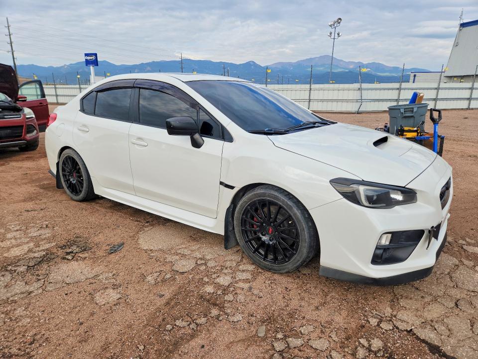 2015 Subaru Wrx VIN JF1VA1D62F9825345 COPART salvage auction — HAIL, CO - CERTIFICATE OF TITLE, sold $2,650 on 2026-09-04 (photo 4)