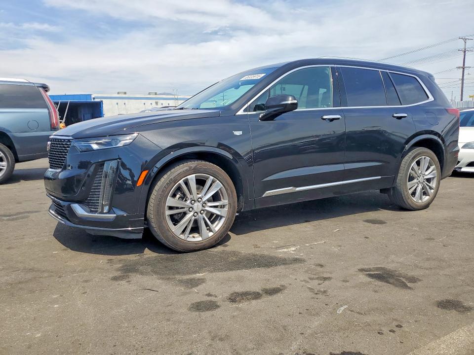 2023 Cadillac Xt6 VIN 1GYKPCRS4PZ220185 COPART salvage auction — SIDE, Ca - Salvage Certificate (P), sold $10,800 on 2026-08-26 (photo 1)