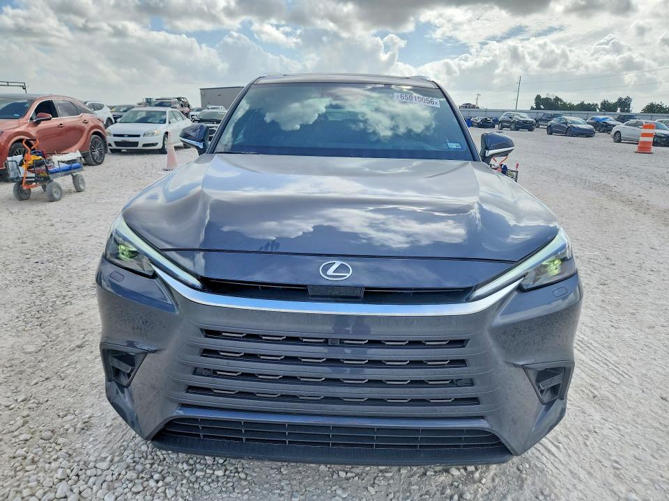 2024 Lexus Tx VIN 5TDAAAB61RS005484 COPART salvage auction — SIDE, Tx - Salvage Vehicle Title, sold $30,250 on 2026-08-27 (photo 5)