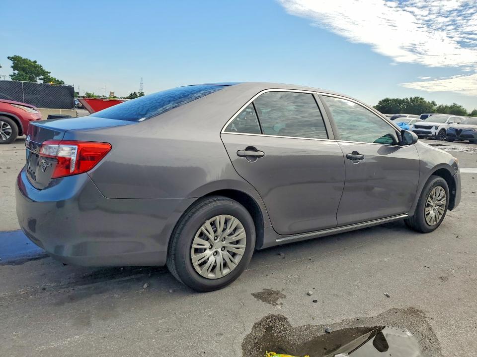 2014 Toyota Camry VIN 4T1BF1FKXEU302039 COPART salvage auction — MINOR DENT/SCRATCHES, Fl - Certificate Of Title, sold $3,100 on 2026-09-03 (photo 3)