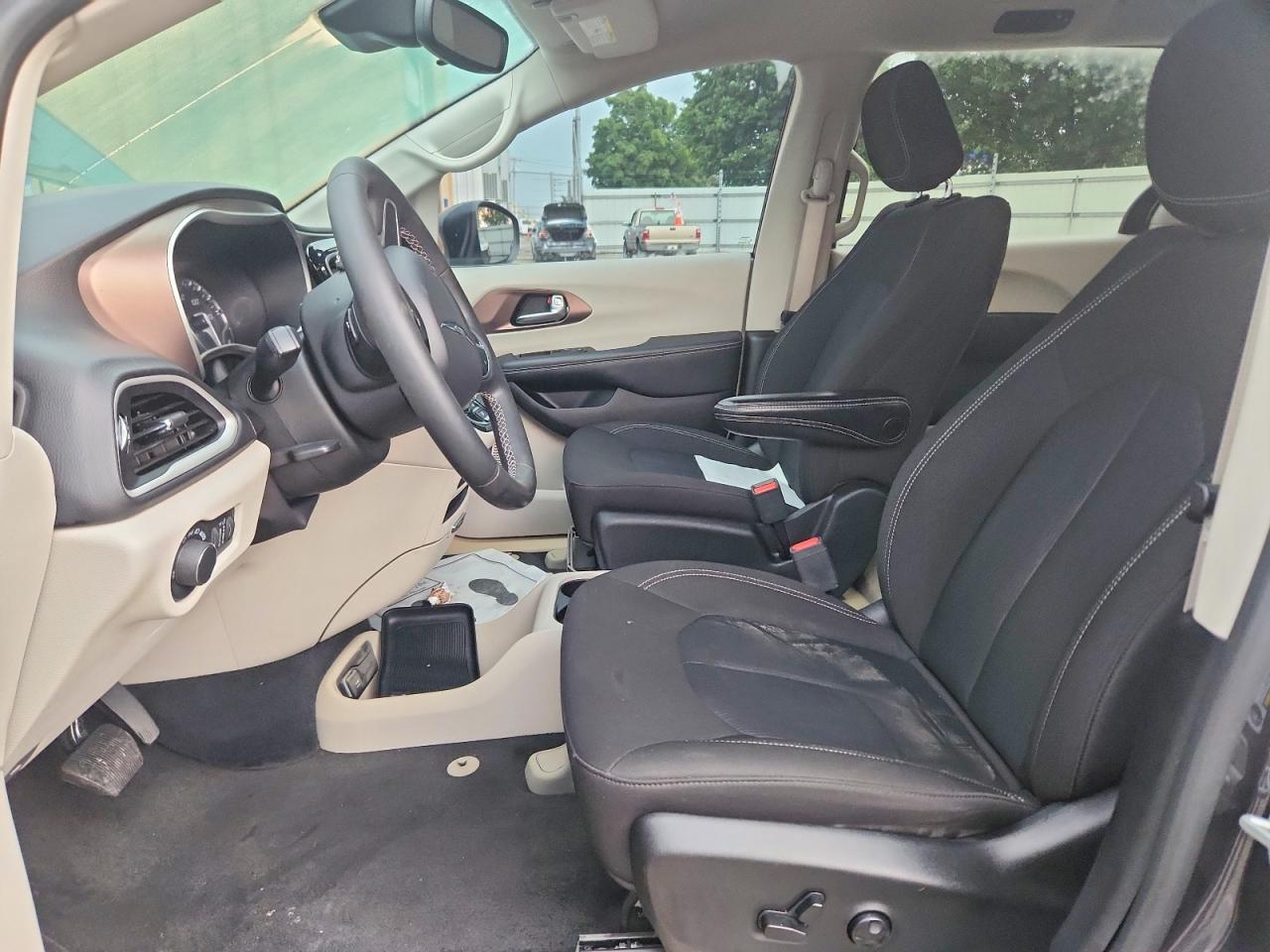 2023 Chrysler Voyager VIN 2C4RC1CG0PR610557 COPART salvage auction — Water/Flood, FL - CERT OF TITLE-SLVG REBLD FLOOD, sold $4,250 on 2026-09-18 (photo 7)