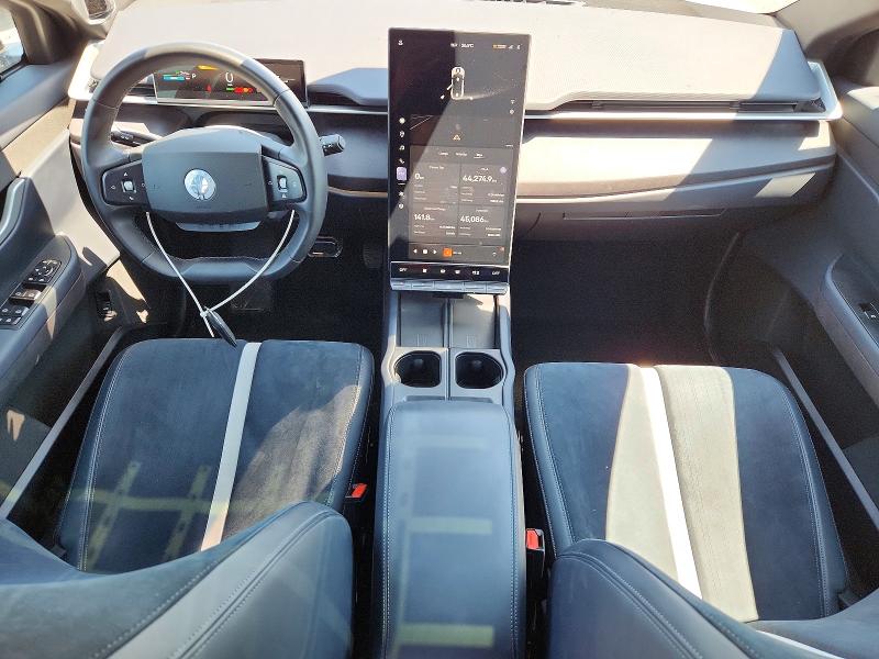 2023 Fisker VIN VCF1EBU25PG010666 COPART salvage auction — SIDE, On - Permit No Brand - Unfit, sold $12,400 on 2026-09-17 (photo 8)