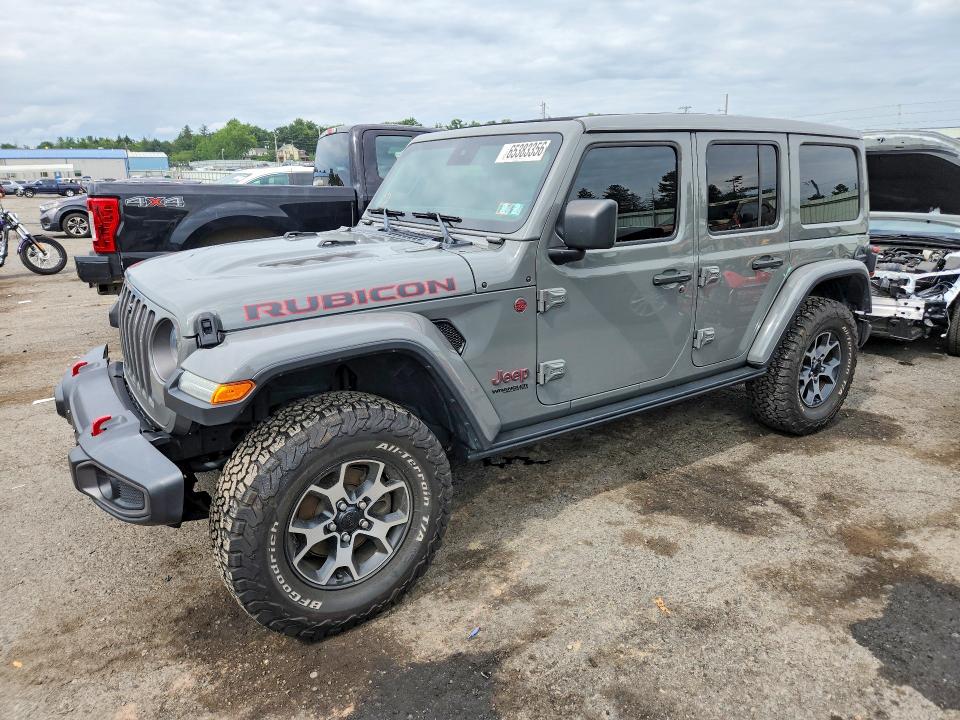 2021 Jeep Wrangler / VIN 1C4HJXFN1MW584603 — COPART salvage auction photo