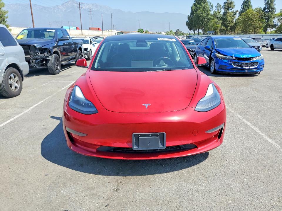 2022 Tesla Model 3 VIN 5YJ3E1EAXNF304189 COPART salvage auction — NORMAL WEAR, Ca - Dis/Dlr/Exp Only Clean Title, sold $7,600 on 2026-09-01 (photo 5)