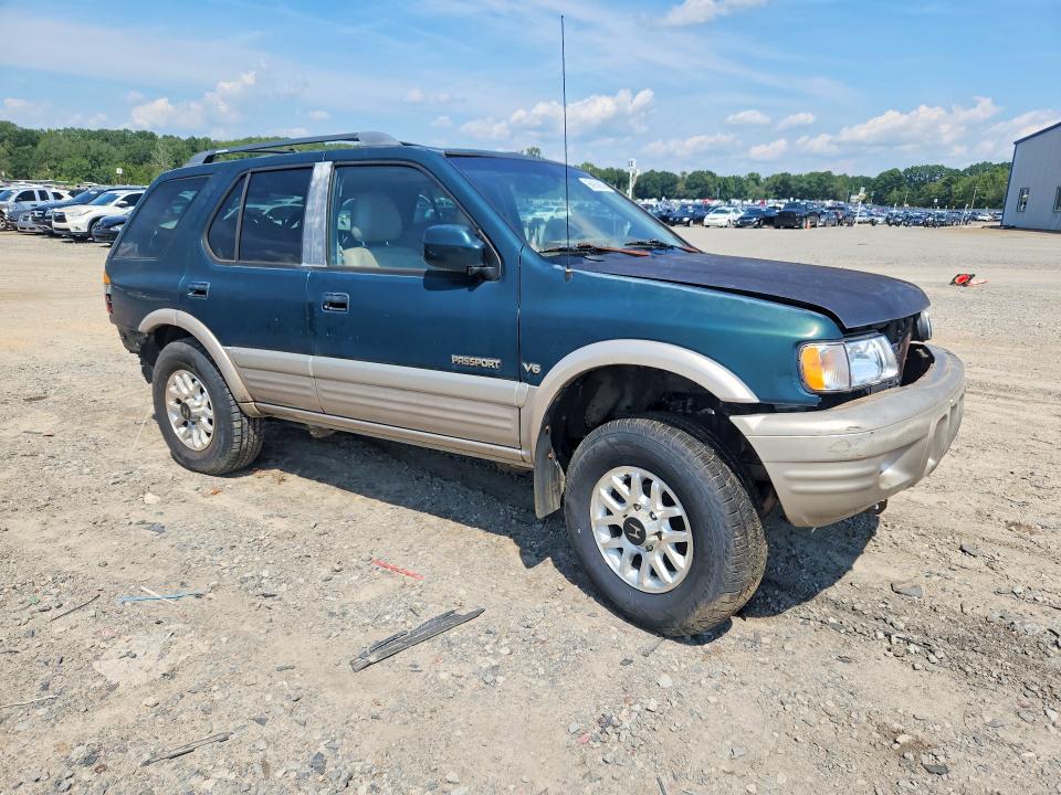 2000 Honda Passport VIN 4S6DM58W7Y4415366 COPART salvage auction — STRIPPED, AR - CERTIFICATE OF TITLE (P), sold $125 on 2026-09-10 (photo 4)