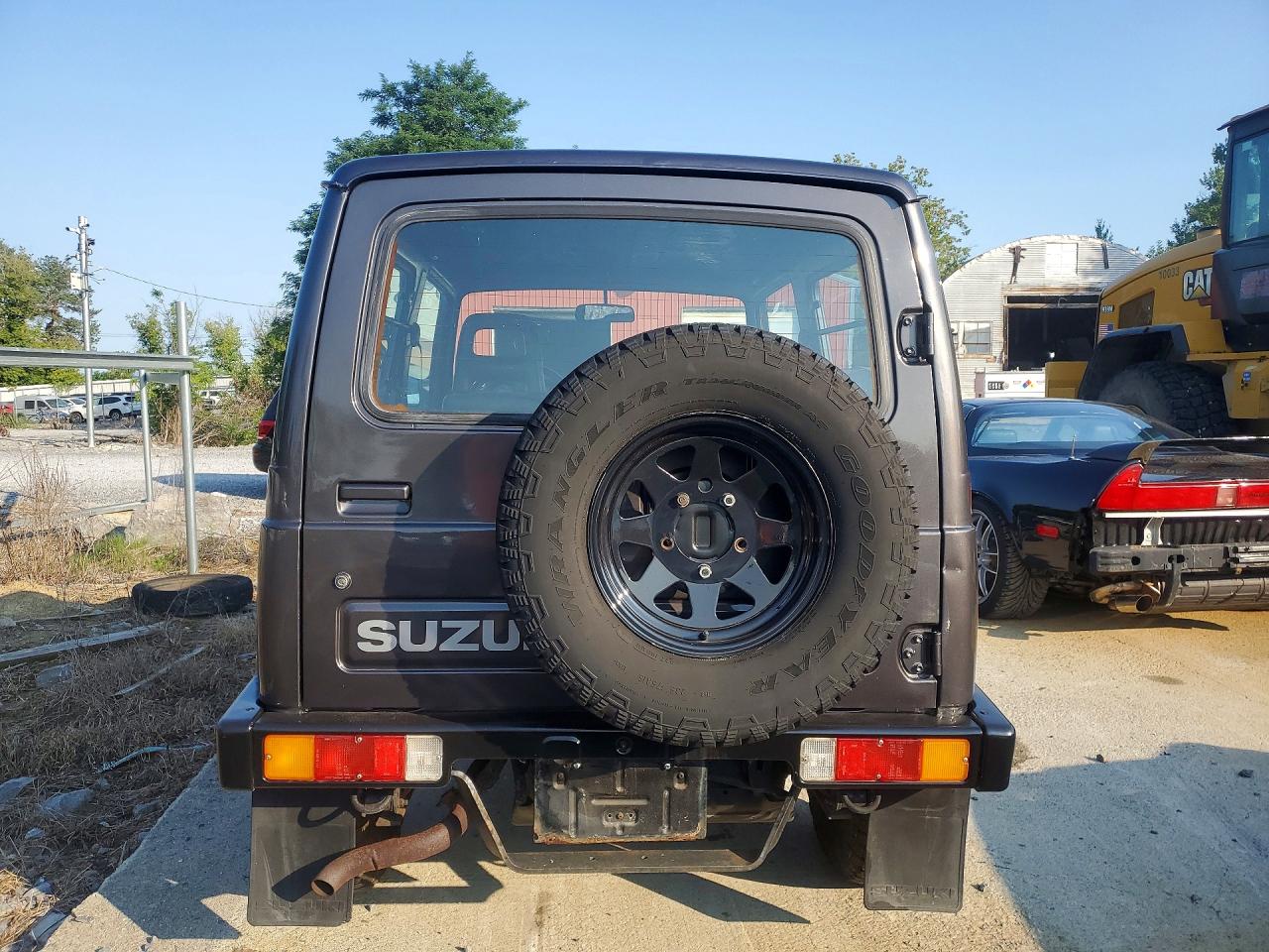 1986 Suzuki Samurai VIN JS3JC51V8G4110639 COPART salvage auction — Water/Flood, FL - CERT OF TITLE-SLVG REBLD FLOOD (P), sold $3,100 on 2026-09-09 (photo 6)