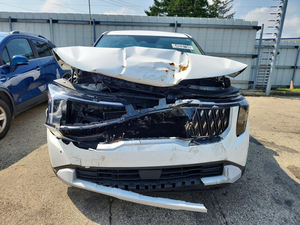 2025 Kia Carnival VIN KNDNB5K30S6495899 COPART salvage auction — FRONT END, FL - CERTIFICATE OF DESTRUCTION, sold $10,200 on 2026-08-24 (photo 5)