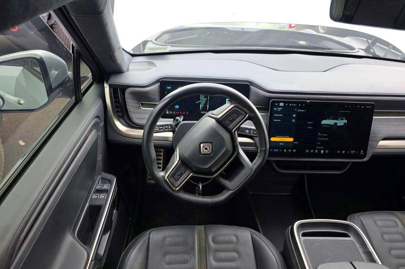 2023 Rivian R1s VIN 7PDSGABA4PN019950 COPART salvage auction — NORMAL WEAR, AZ - CERT OF TITLE-RESTORED SALVAGE (P), sold $39,250 on 2026-09-02 (photo 7)