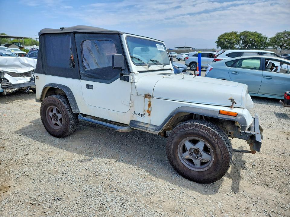 1993 Jeep Wrangler / VIN 1J4FY19P3PP219989 COPART salvage auction — FRONT END, CA - DIS/DLR/EXP ONLY CLEAN TITLE, sold $1,600 on 2026-08-21 (photo 4)