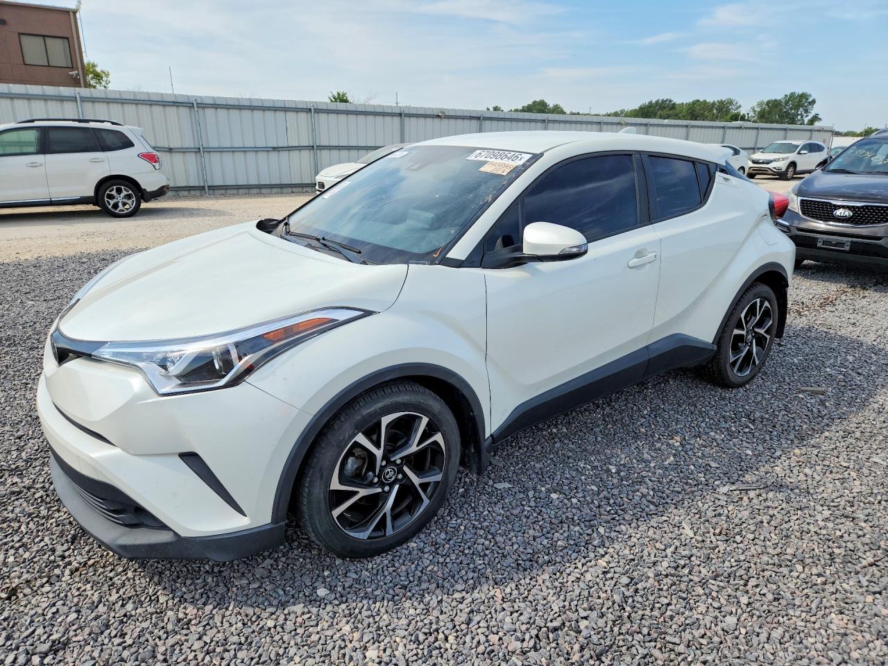 2019 Toyota C-HR VIN JTNKHMBXXK1060959 — COPART salvage auction photo