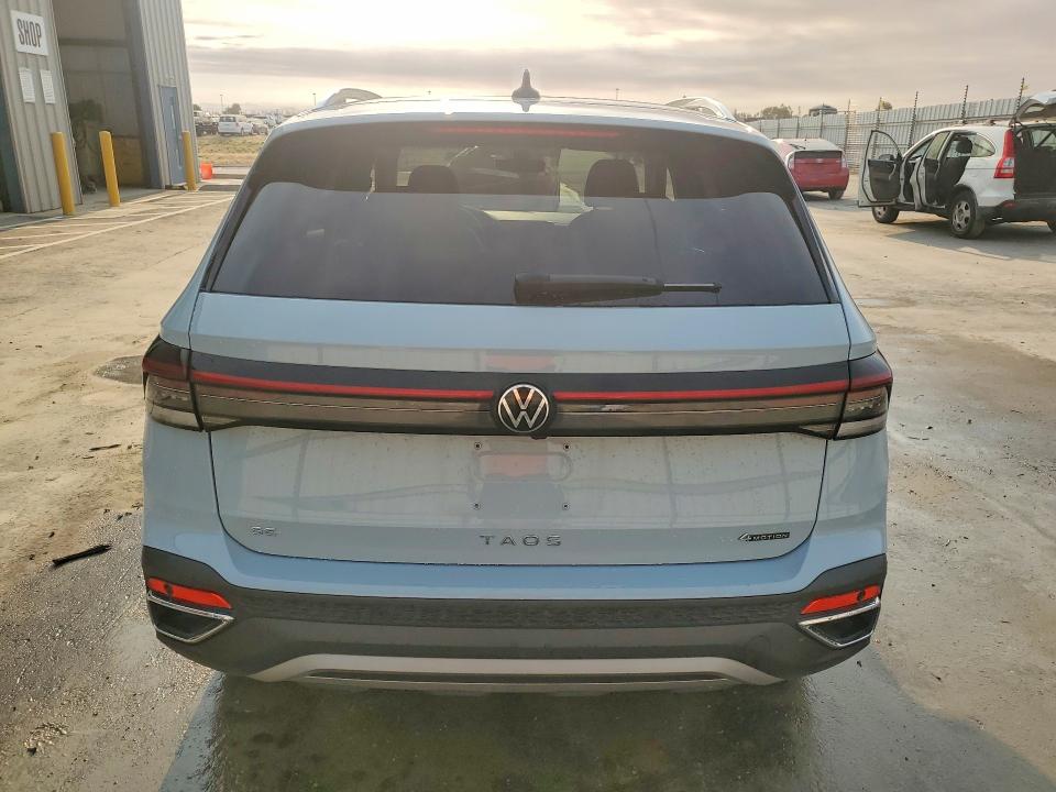 2025 Volkswagen Taos VIN 3VVVC7B28SM034550 COPART salvage auction — MINOR DENT/SCRATCHES, Nv - Certificate Of Title, sold $16,200 on 2026-08-25 (photo 6)