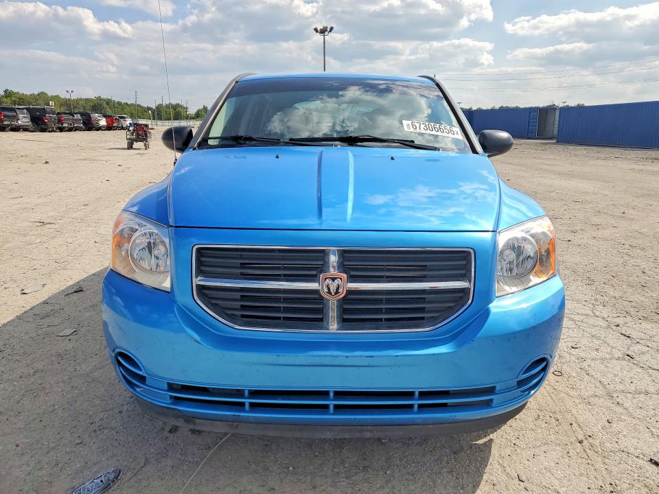 2009 Dodge Caliber VIN 1B3HB48A09D150666 COPART salvage auction — MINOR DENT/SCRATCHES, IN - CERTIFICATE OF TITLE, sold $200 on 2026-09-11 (photo 5)