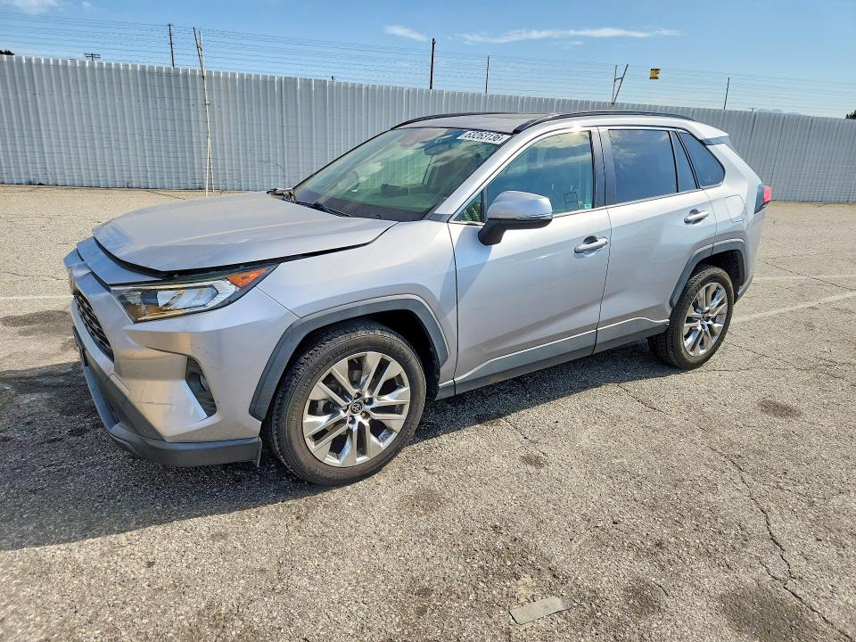 2019 Toyota Rav 4 VIN JTMA1RFV5KD511515 — COPART salvage auction photo
