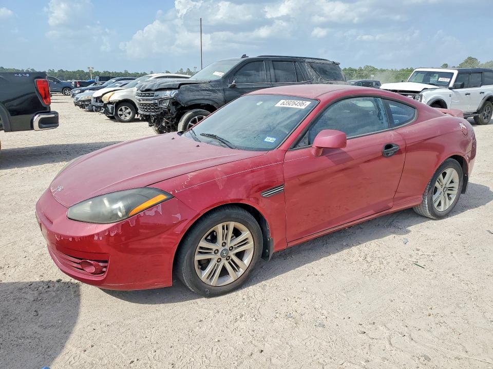 2008 Hyun Tiburon VIN KMHHM66D38U277696 COPART salvage auction — MINOR DENT/SCRATCHES, TX - CERTIFICATE OF TITLE, sold $625 on 2026-08-25 (photo 1)