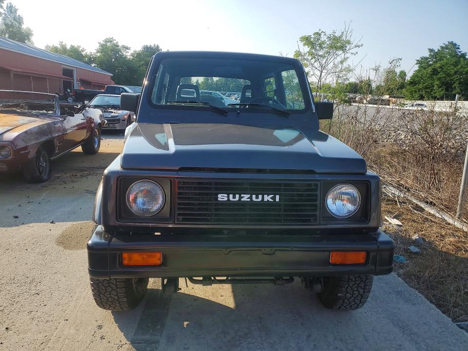 1986 Suzuki Samurai VIN JS3JC51V8G4110639 COPART salvage auction — WATER/FLOOD, FL - CERT OF TITLE-SLVG REBLD FLOOD (P), sold $2,650 on 2026-09-14 (photo 5)