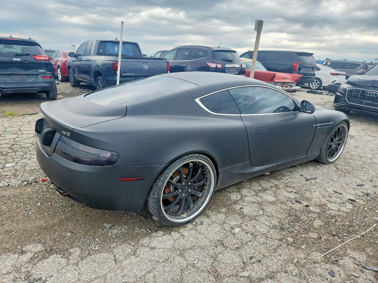 2012 Aston Martin DB9 VIN SCFFDAAE3CGA14490 COPART salvage auction — Mechanical, IN - CERT OF TITLE - REBUILT VEHICL (P), sold $17,100 on 2026-08-26 (photo 3)