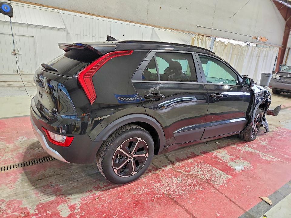 2025 Kia Niro VIN KNDCP3LE2S5306396 COPART salvage auction — SIDE, TX - SALVAGE VEHICLE TITLE, sold $7,400 on 2026-08-19 (photo 3)