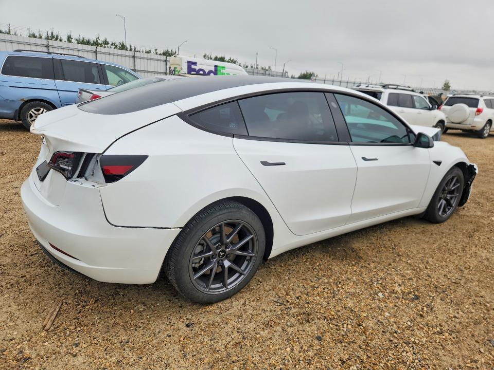 2023 Tesla Model 3 VIN LRW3E1FA0PC871958 COPART salvage auction — REAR END, Ab - Bos - Salvage, sold $9,800 on 2026-09-03 (photo 3)