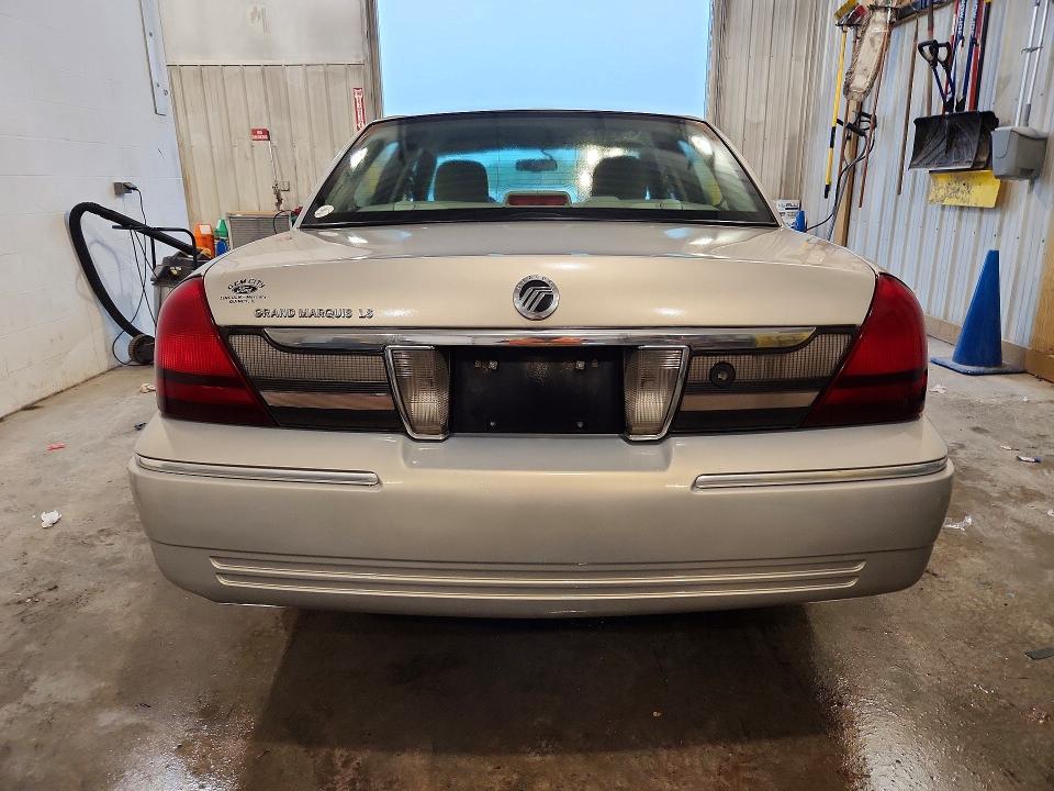 2010 Mercury Grand marquis VIN 2MEBM7FV8AX600789 COPART salvage auction — FRONT END, Mo - Salvage Certificate Of Title, sold $1,300 on 2026-09-08 (photo 6)