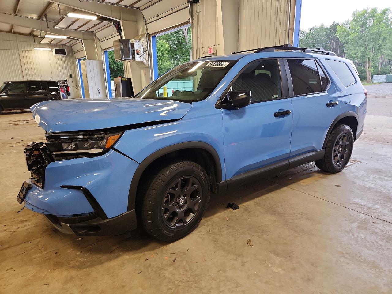 2025 Honda Pilot VIN 5FNYG1H64SB028207 — COPART salvage auction photo