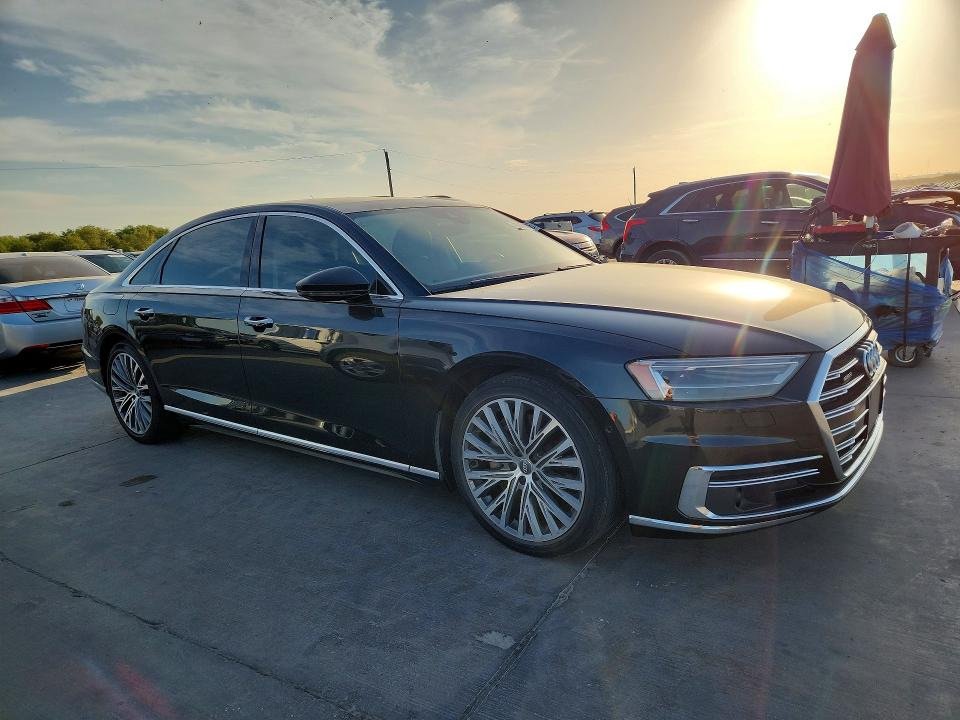 2019 Audi A8 VIN WAU8DAF83KN015749 COPART salvage auction — WATER/FLOOD, TX, sold $12,000 on 2026-10-08 (photo 4)