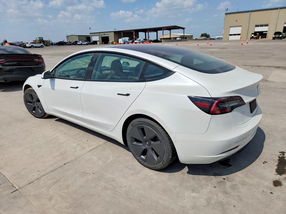 2021 Tesla Model 3 VIN 5YJ3E1EA8MF100280 COPART salvage auction — MINOR DENT/SCRATCHES, SC - CERTIFICATE OF TITLE, sold $11,300 on 2026-09-10 (photo 2)