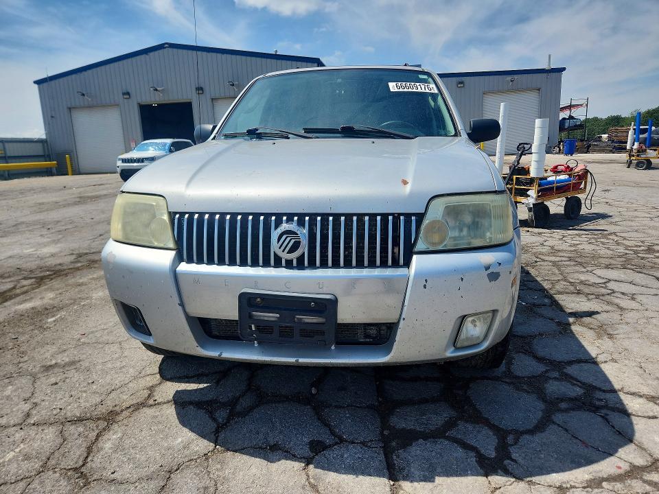 2007 Mercury Mariner VIN 4M2CU87187KJ13752 COPART salvage auction — WATER/FLOOD, MO - JUNKING CERTIFICATE, sold $100 on 2026-09-28 (photo 5)
