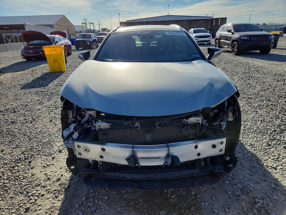 2021 Lexus Ux VIN JTHP9JBH8M2044933 COPART salvage auction — FRONT END, CO - PUBLIC - SALVAGE TITLE, sold $10,900 on 2026-09-08 (photo 5)