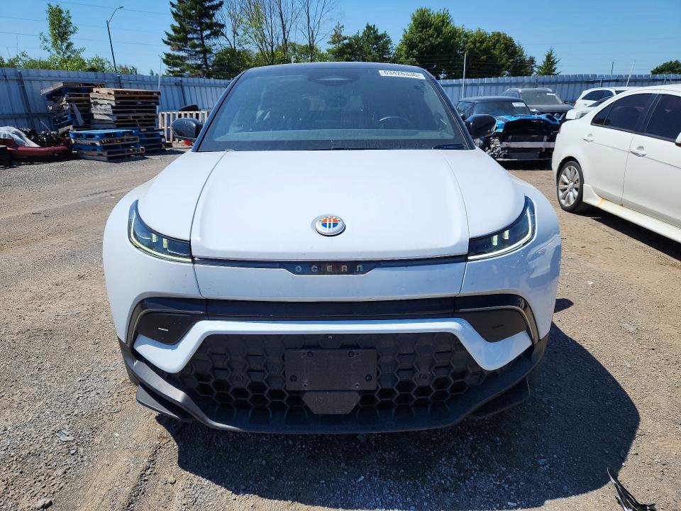 2023 Fisker VIN VCF1EBU25PG010666 COPART salvage auction — SIDE, On - Permit No Brand - Unfit, sold $12,400 on 2026-09-17 (photo 5)