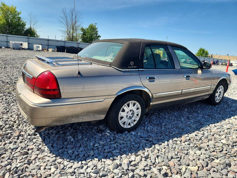 2005 Mercury Grand marquis VIN 2MEFM74W65X623457 COPART salvage auction — MINOR DENT/SCRATCHES, WI - CERTIFICATE OF TITLE, sold $700 on 2026-08-31 (photo 3)