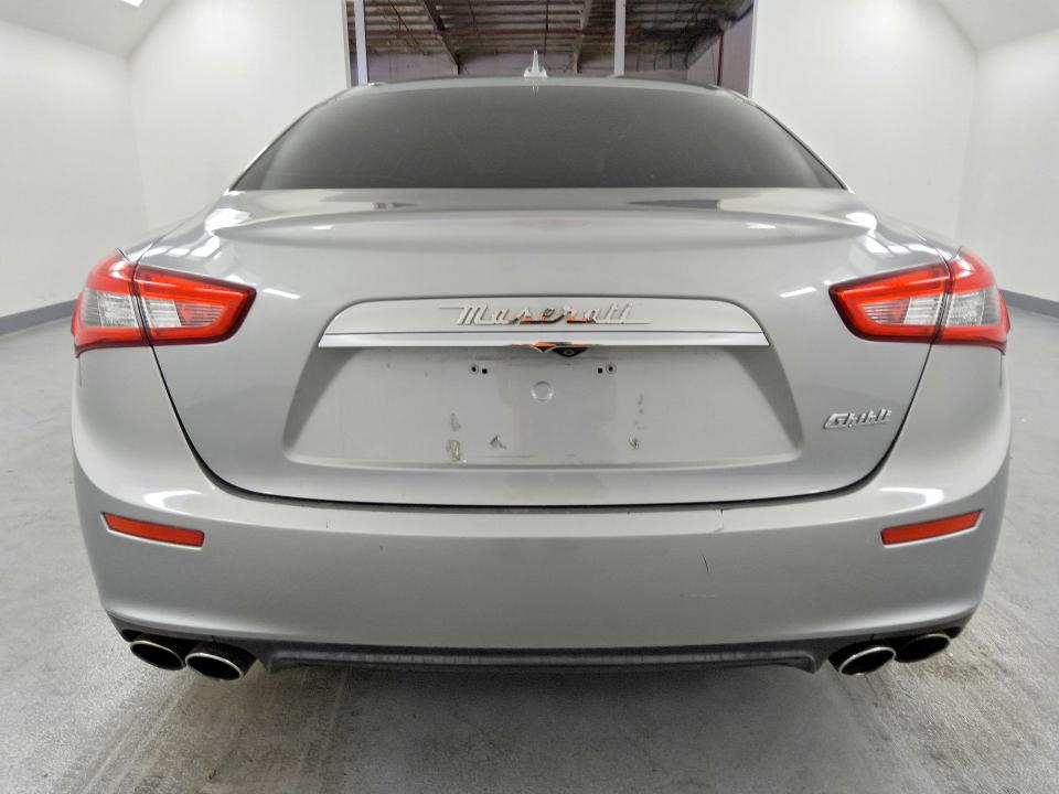 2014 Maserati Ghibli VIN ZAM57XSA5E1091487 COPART salvage auction — MINOR DENT/SCRATCHES, Ca - Dis/Dlr/Exp Only Clean Title, sold $3,800 on 2026-09-03 (photo 6)