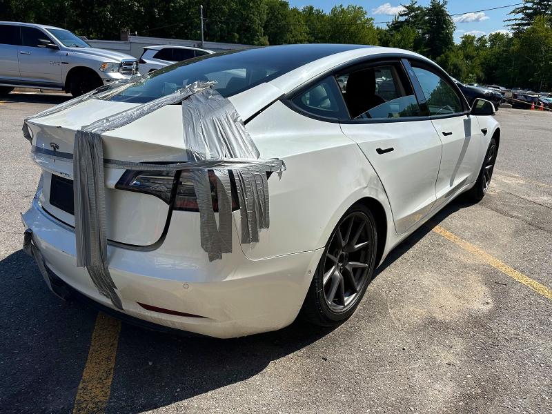 2021 Tesla Model 3 VIN 5YJ3E1EA9MF857852 COPART salvage auction — REAR END, Va - Certificate Of Title, sold $7,800 on 2026-09-23 (photo 3)